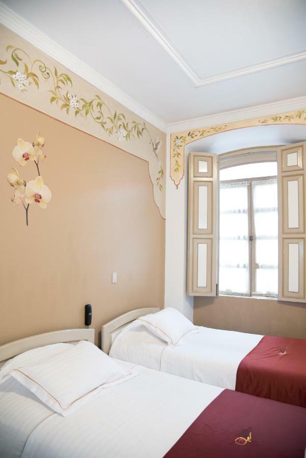 Hotel La Orquidea Cuenca Bagian luar foto